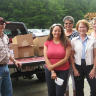Image of volunteers delivering groceries